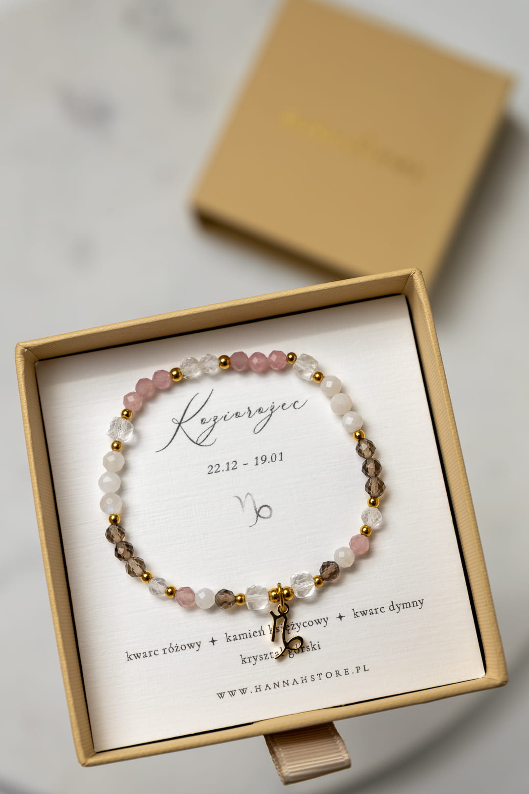 KOZIOROŻEC - bransoletka znaku zodiaku na gumce - kwarc różowy, kamień księżycowy, kwarc dymny, kryształ górski